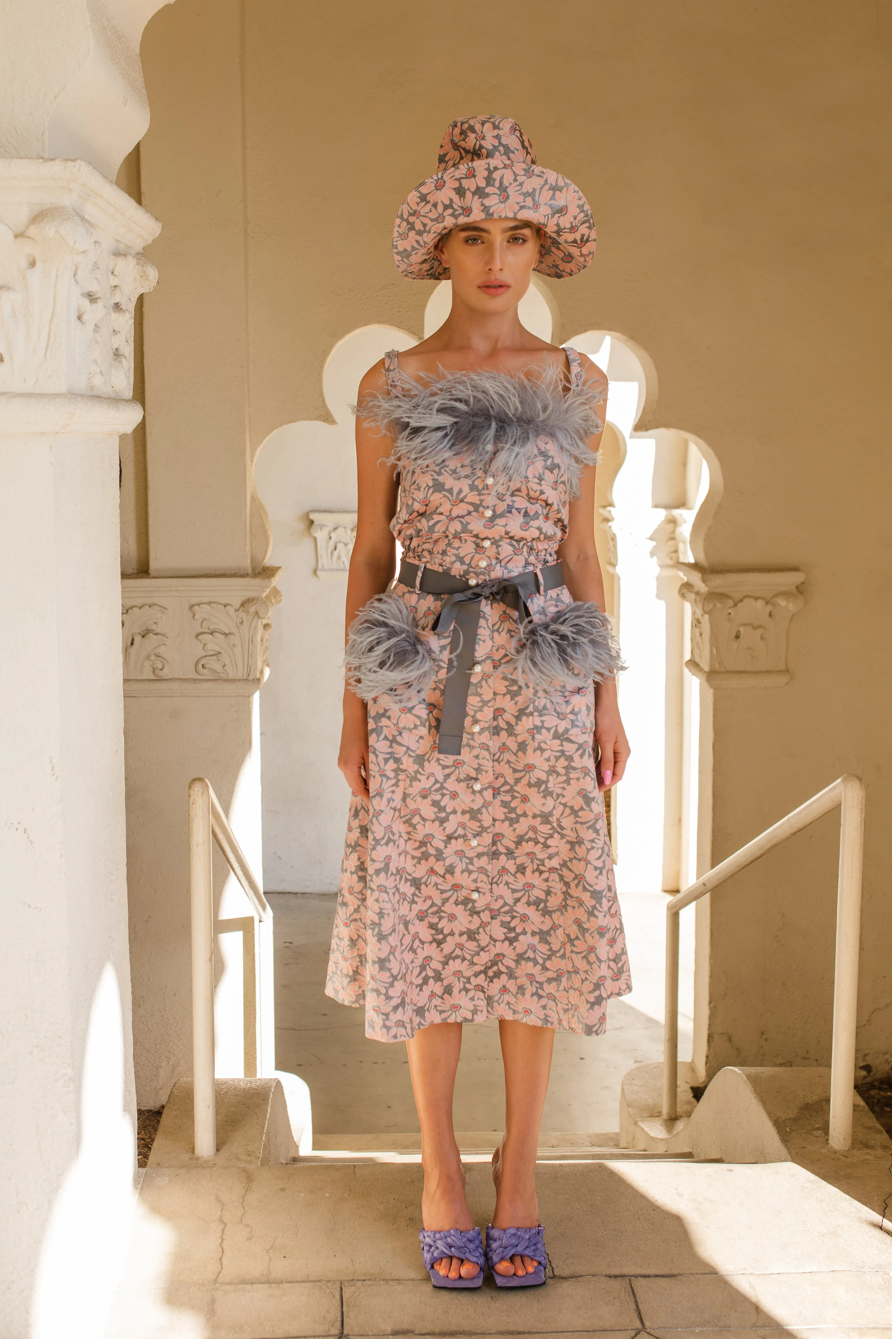 Grey flower top with feather details and pearl buttons